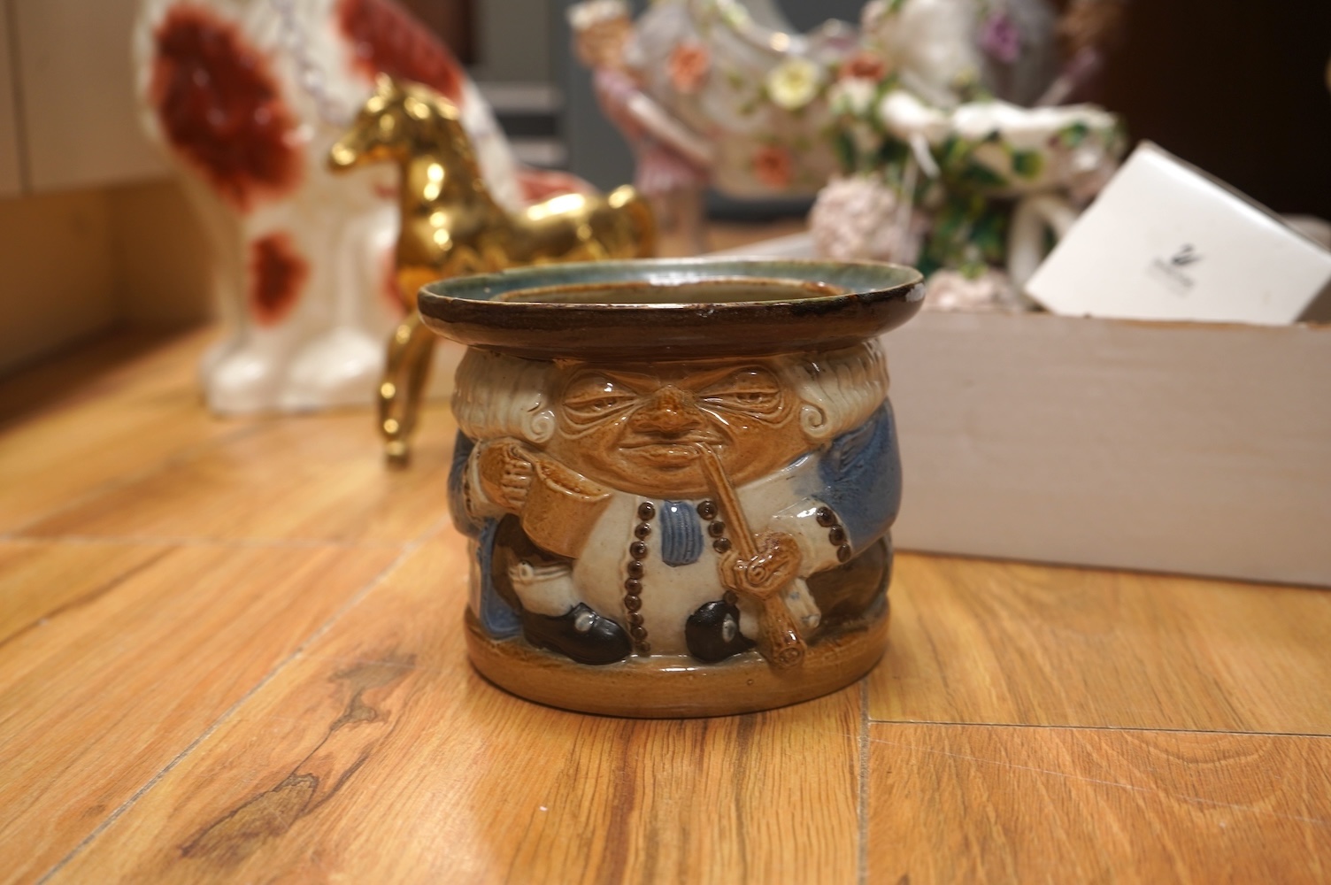 A schneeballen figure, Staffordshire dog, Doulton jar and mixed decorative china etc., tallest 36cm high. Condition - variable